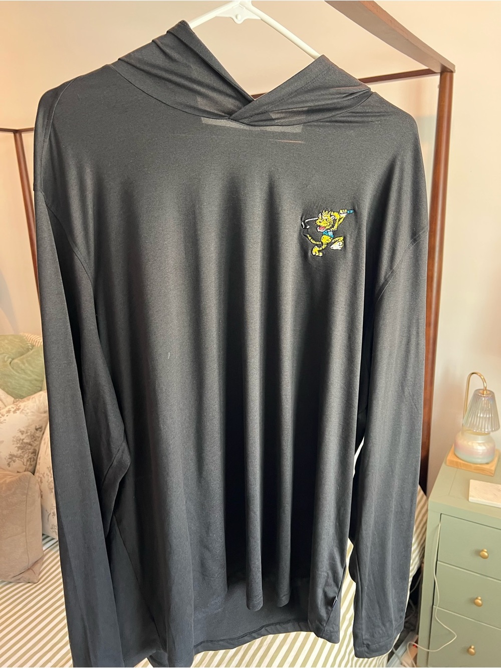 Swinging Jacksonville Jaguar Cutter and Buck hoodie with St. John’s GCC logo